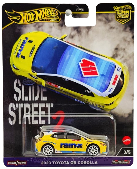 Hot Wheels 2024 - Premium / Car Culture / rain-x / Slide Street 3/5 - 2023 Toyota GR Corolla - Yellow / rain-x - Metal/Metal & Real Riders - NEW Casting