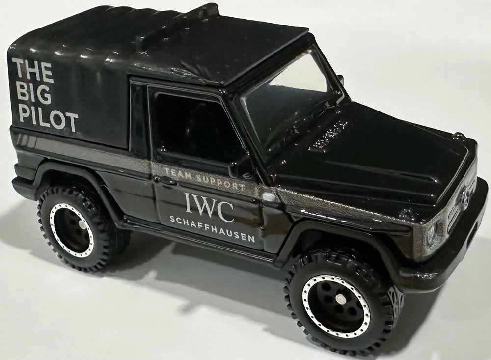 Hot Wheels 2023 - Premium / Car Culture / HW Off Road # 3/5 - 1993 Mercedes-Benz G-Class - Black / 'The Big Pilot' - Metal/Metal & Real Riders